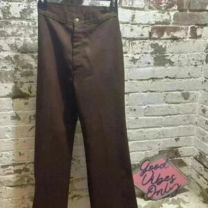 VINTAGE LEVI brown bell bottoms.  24 inch waist.  Rise 14 inches. 29 inch inseam